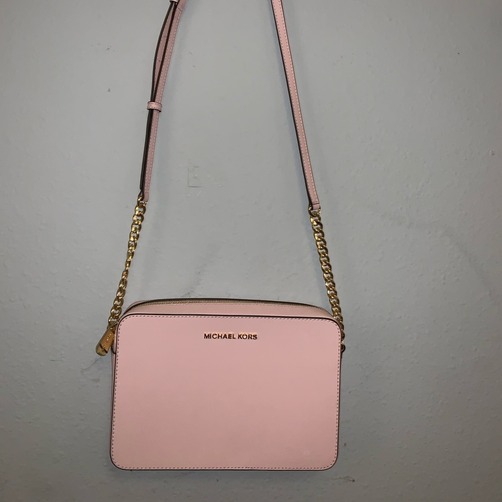 light pink Michael Kors cross over purse